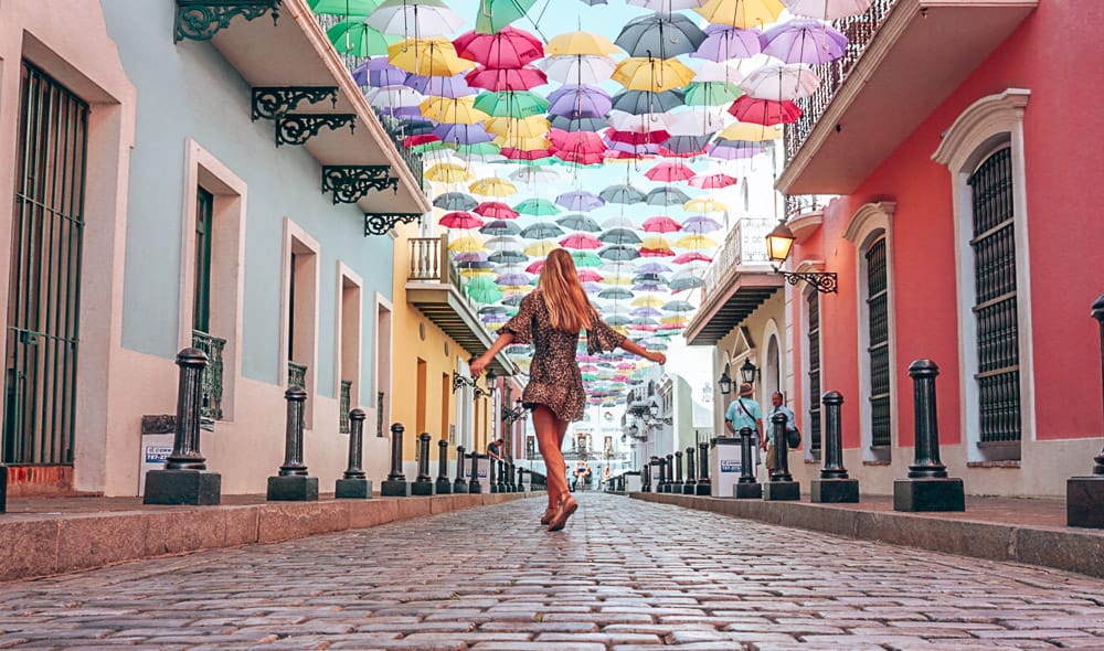 woman dancing on fortaleza street in old san juan